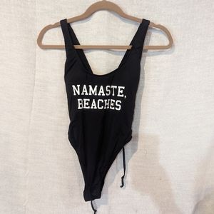 The bikini lab one piece suit size medium (I)